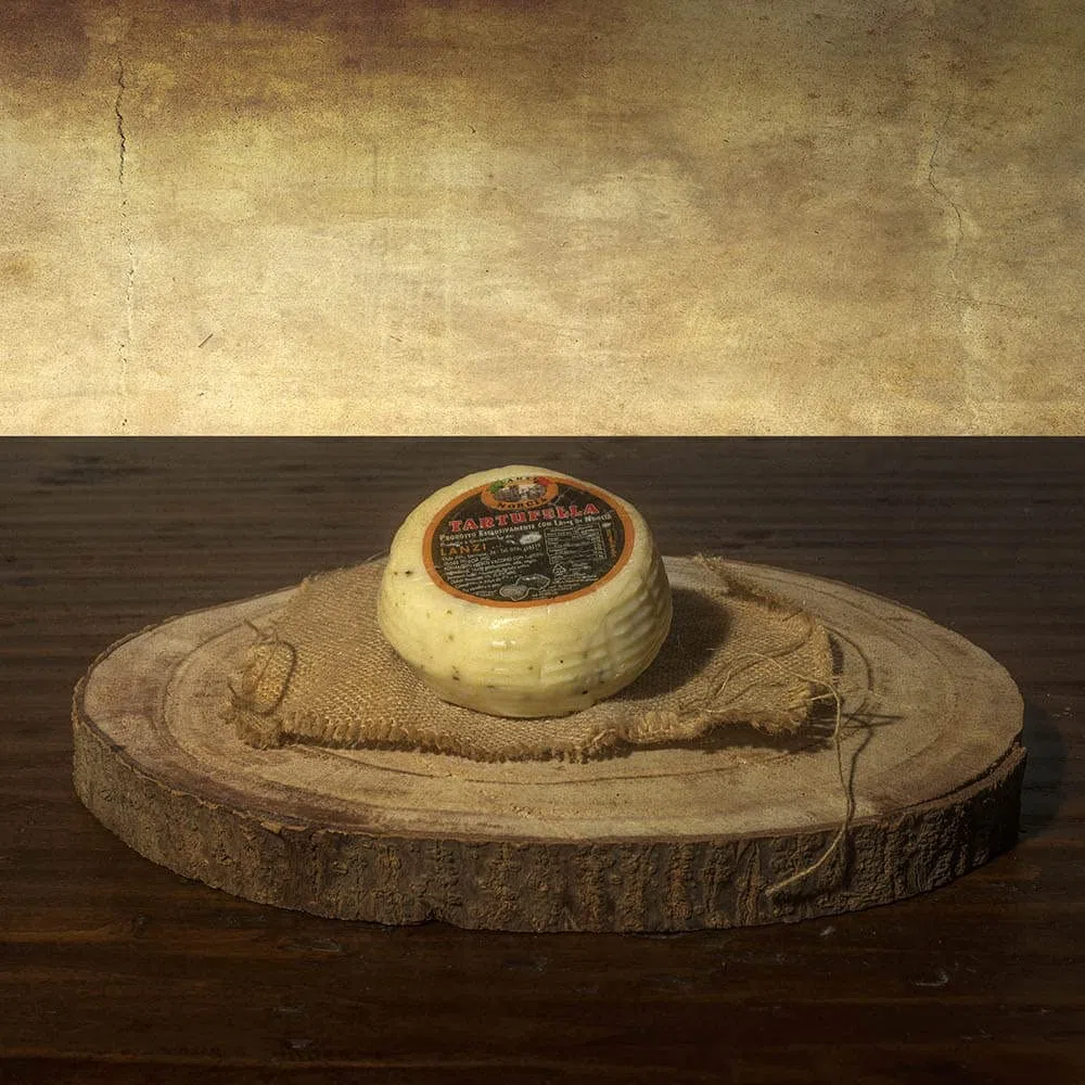 Formaggio vaccino speziato al tartufo 1000g